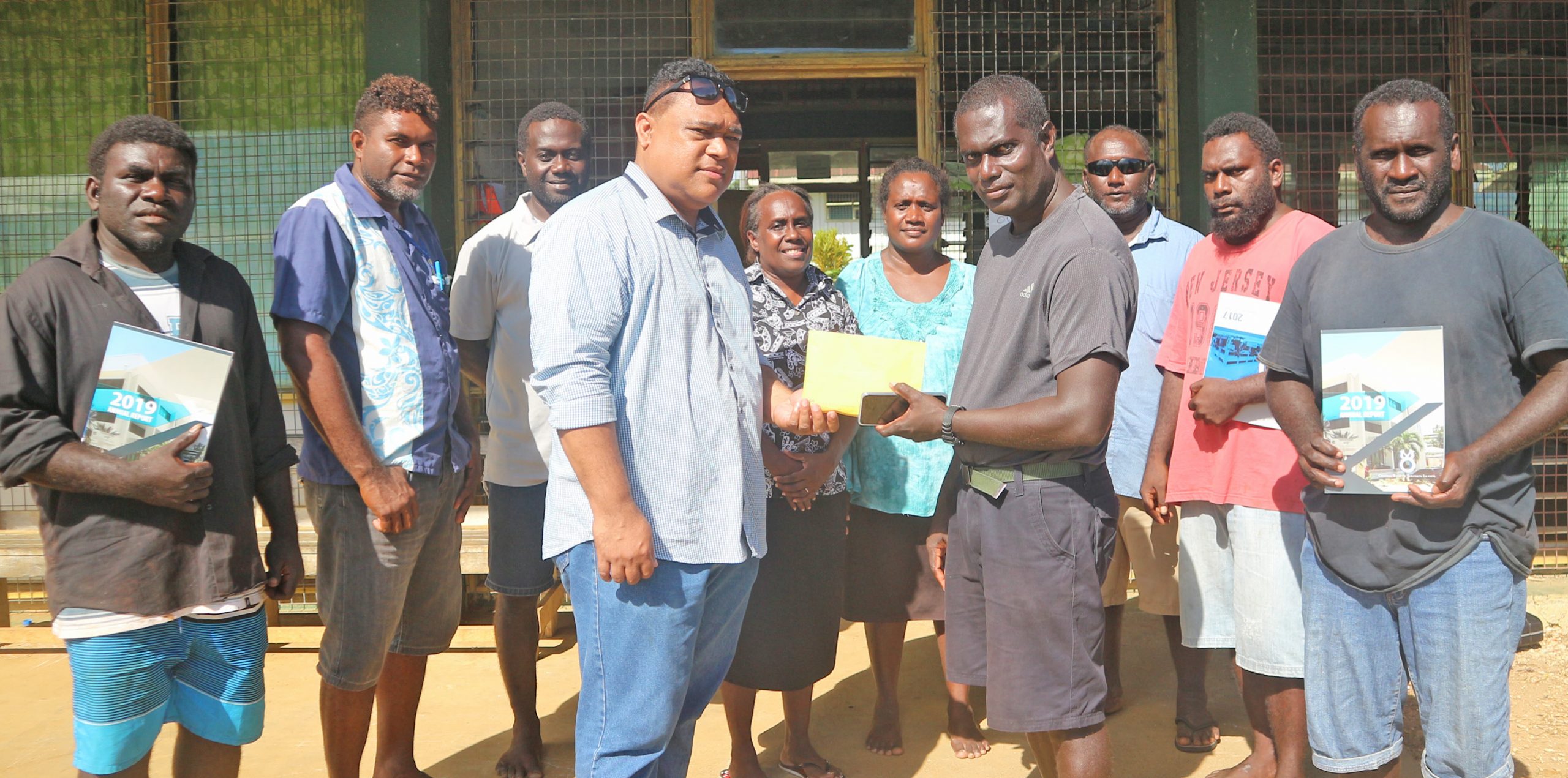 Gov hands over donation to Principal and teachers of Choiseul Bay P.S.S.